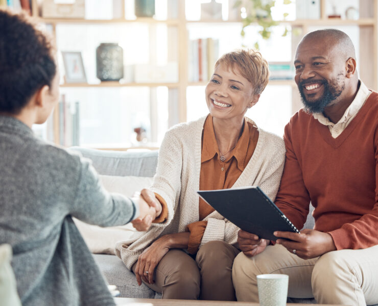 Business meeting, welcome handshake and couple meet with lawyer or financial advisor. Elderly married man, wife and woman retirement conversation, planning and insurance documents for estate finance